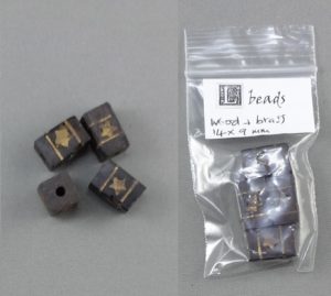 Wooden beads with brass stars
